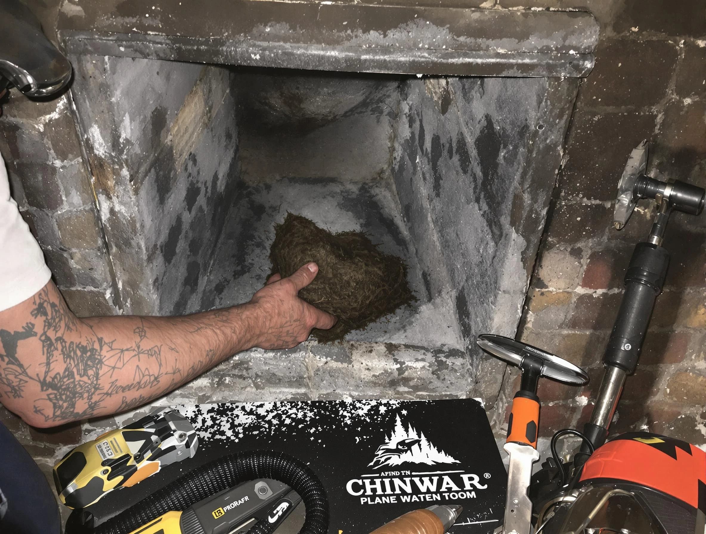 Salt Lake City Chimney Sweep safely removing debris and screening chimney in Salt Lake City, UT
