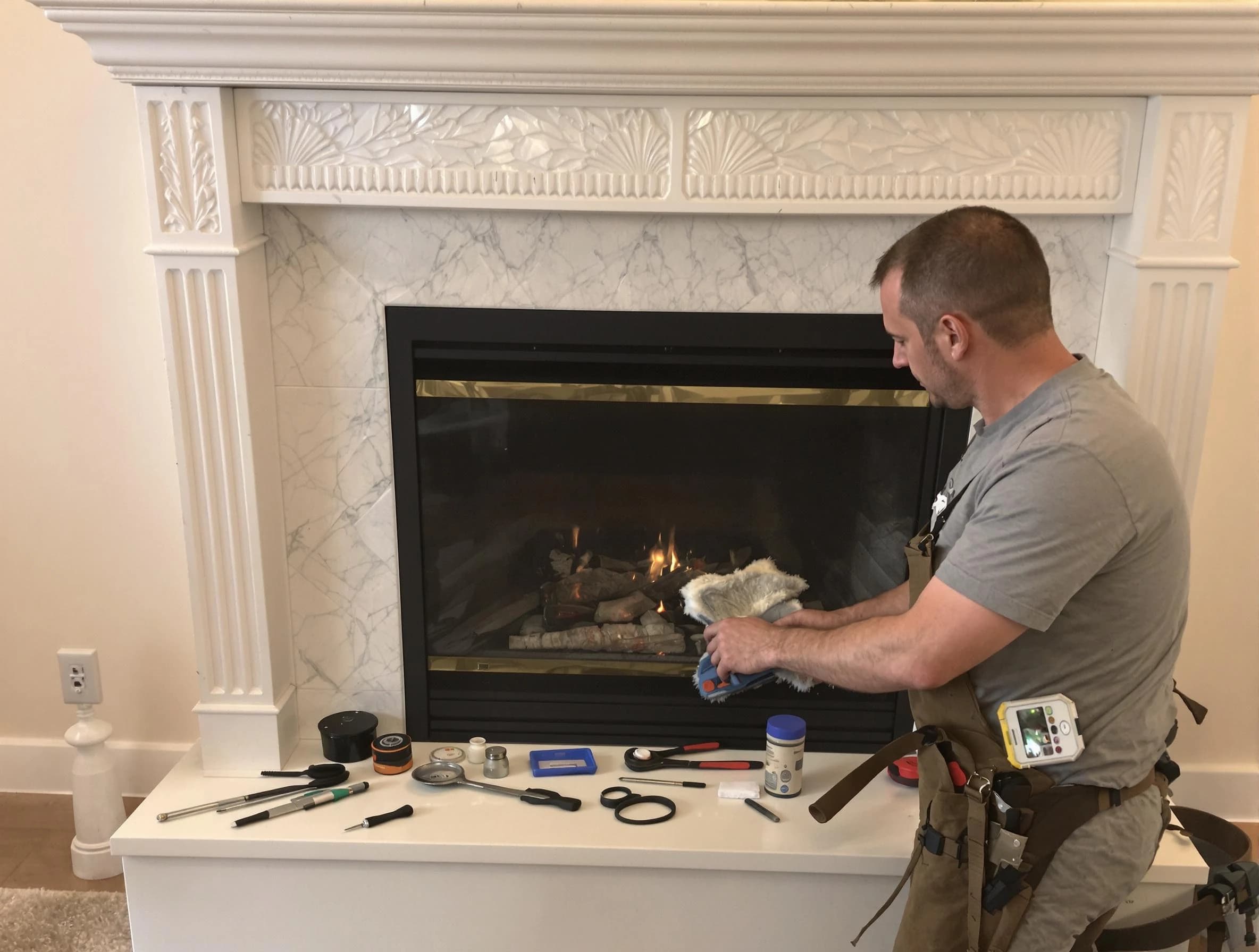 Salt Lake City Chimney Sweep performing fireplace maintenance in Salt Lake City, UT